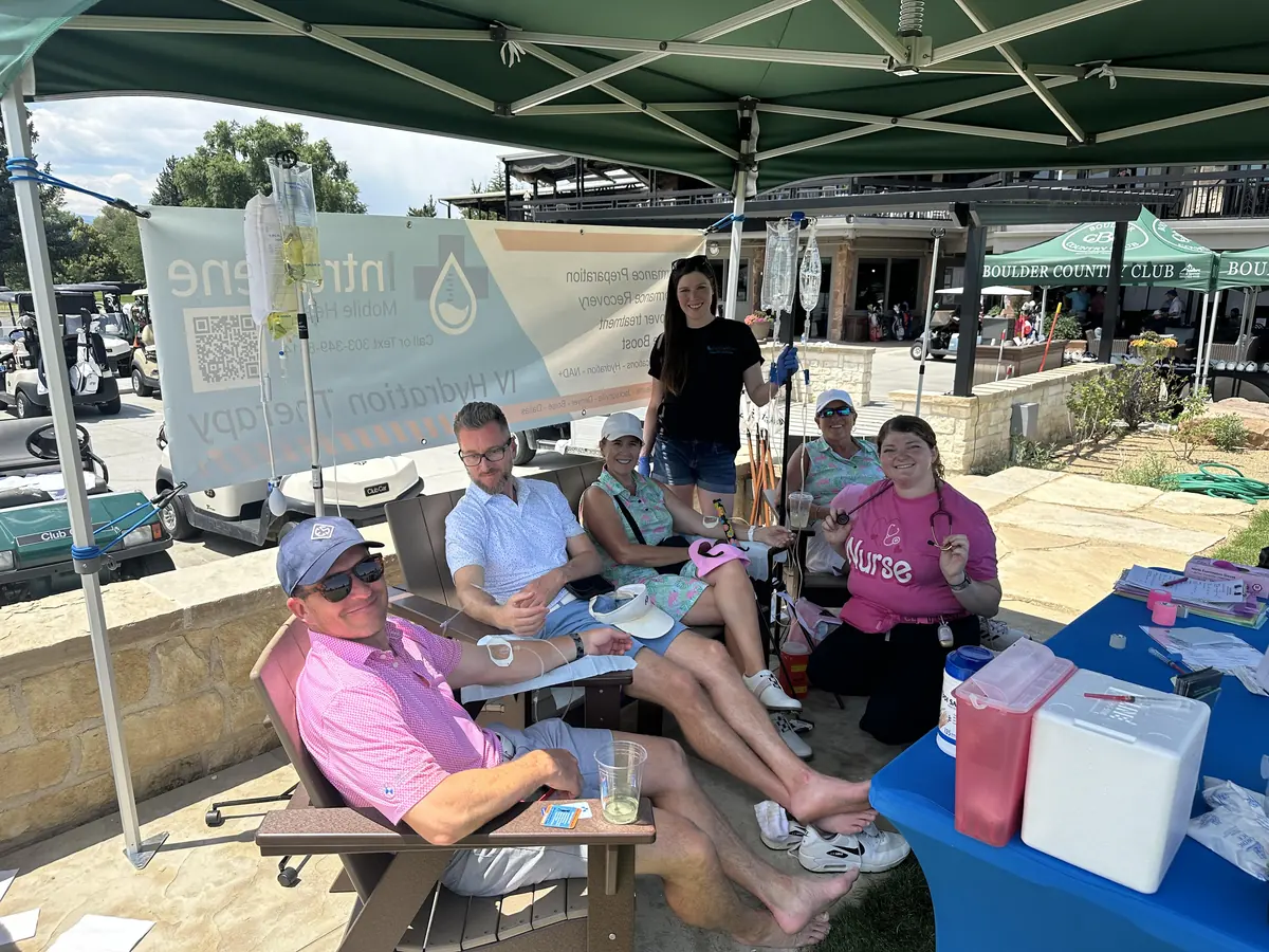 Intravene nurses running an IV hydration tent at a Colorado country club
